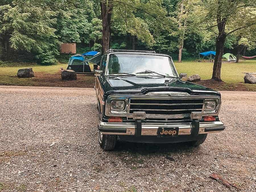 dad-daughters-camping-adventure-jeep-grand-wagoneer