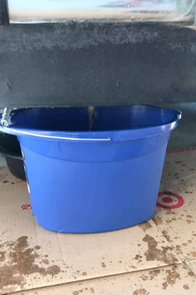 drain radiator coolant into a bucket from a Jeep