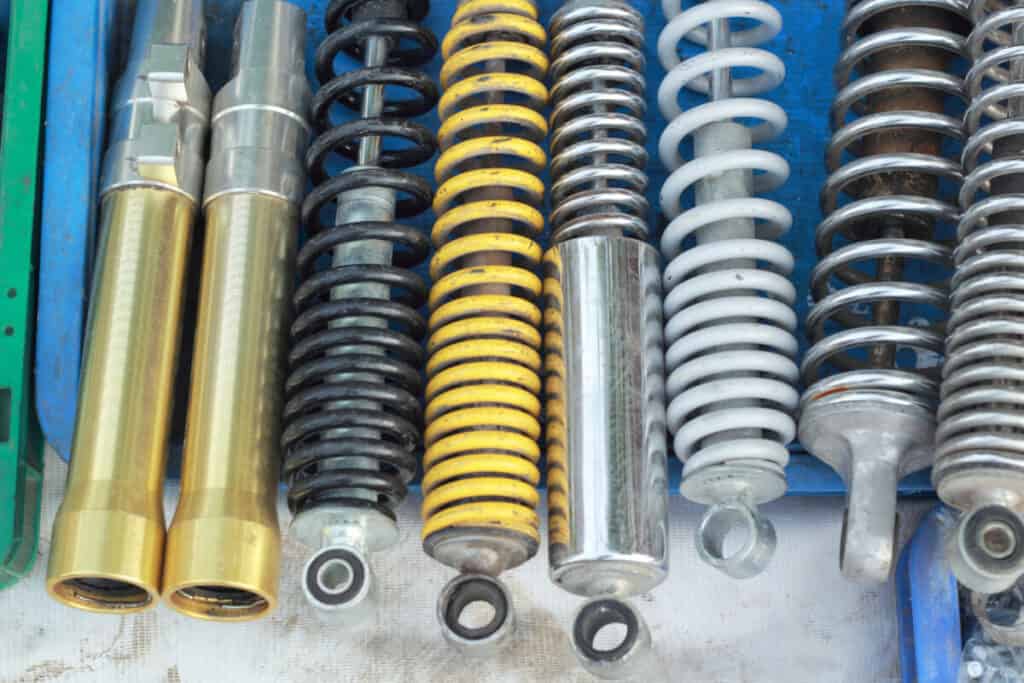 How Long Do Shocks Last On A Jeep Wrangler? 1 A generic image of different colored and sizes shocks as a reference for the article on how long do shocks last on a Jeep Wrangler.