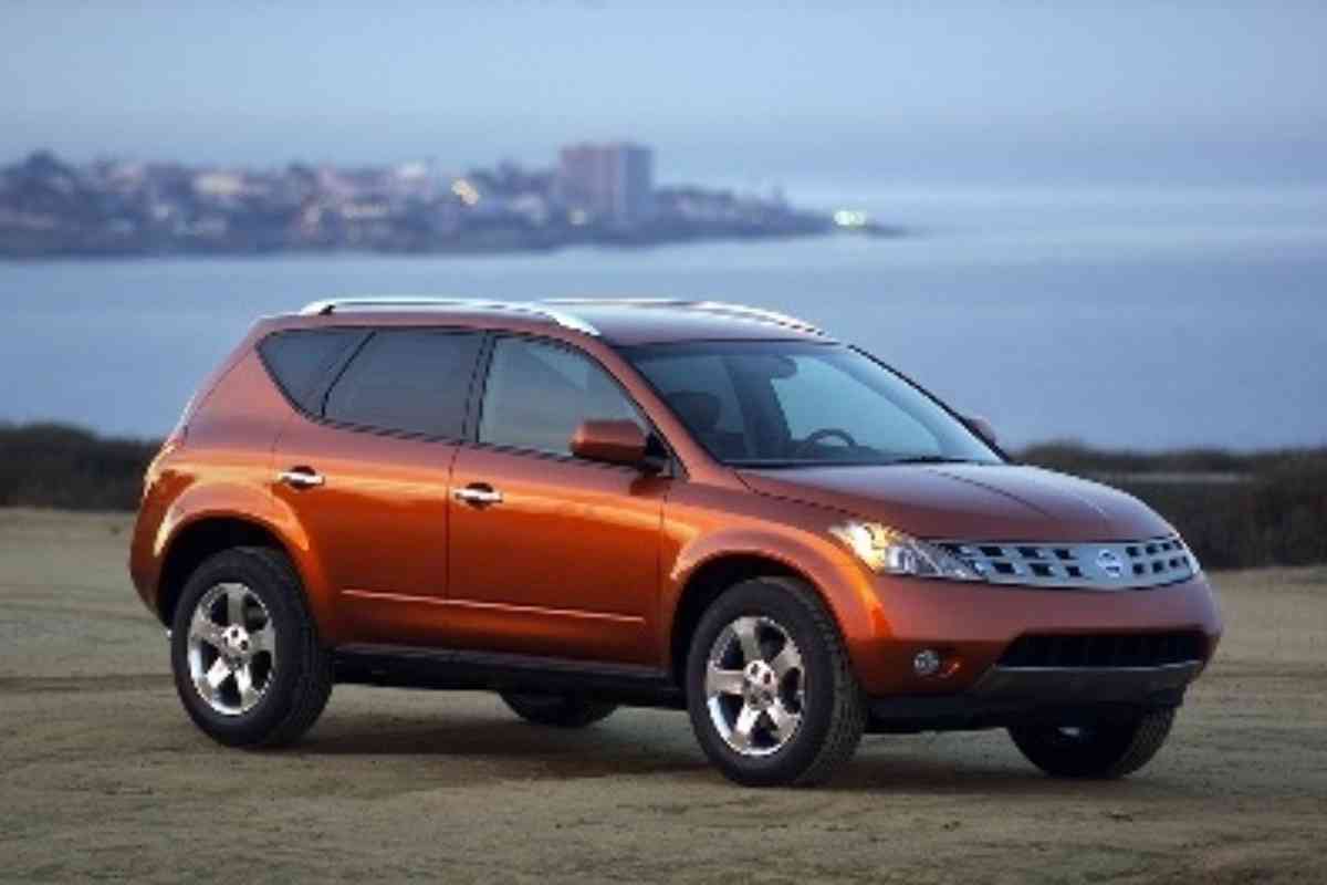 Image for Nissan Murano hesitation when accelerating shows a copper colored Nissan Murano against an ocean background

