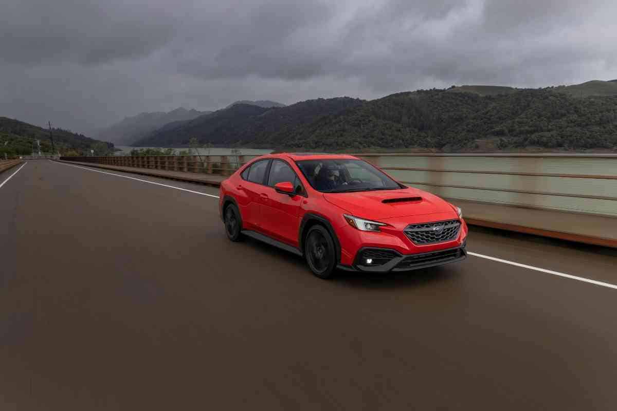 Do Subaru engines burn oil? Generic image of a red Subaru WRX in the highway