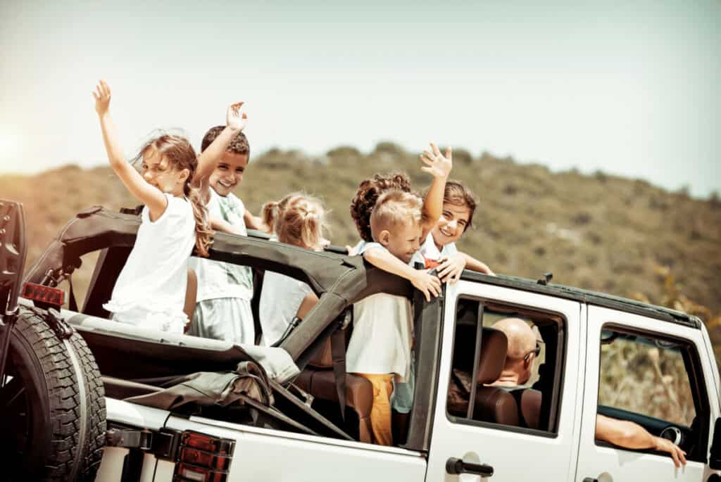 128646734 l 1 1024x685 1 Can a Child Ride in a Jeep With the Doors Off?