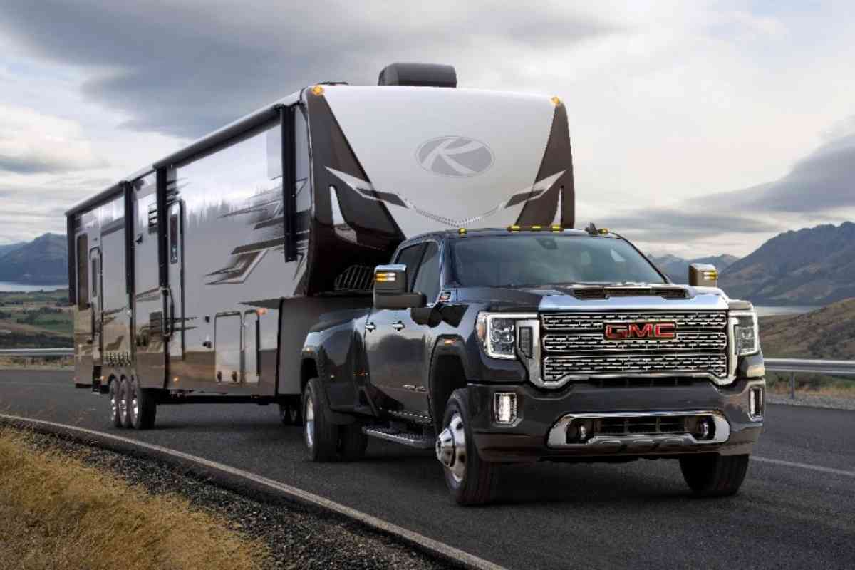 What is the GMC Sierra Max Trailering Package? The image shows a GMC Sierra towing a large trailer
