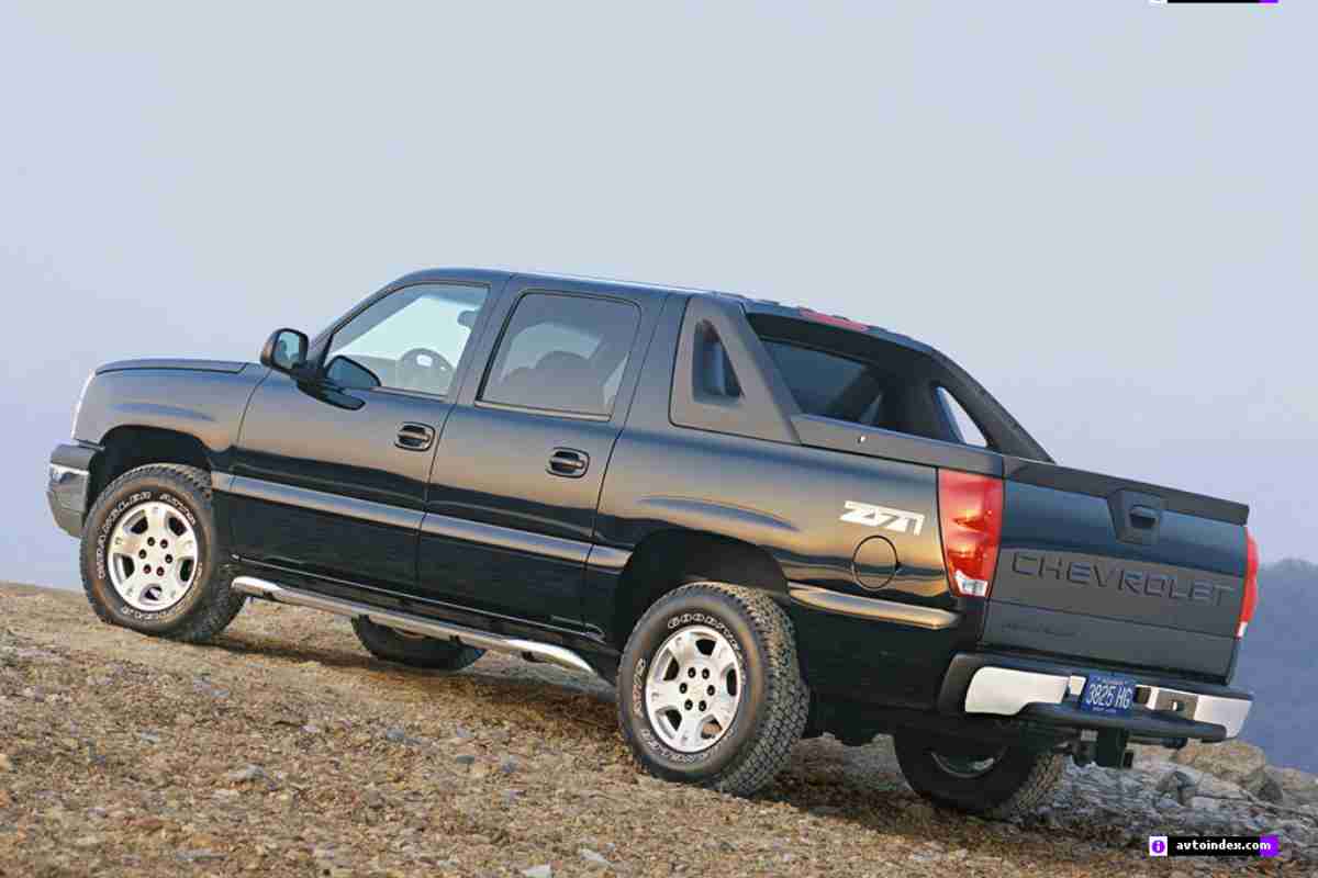 What are the worst Chevy Avalanche years to avoid? The image shows a first generation  Chevy Avalanche, in black, going up a hill