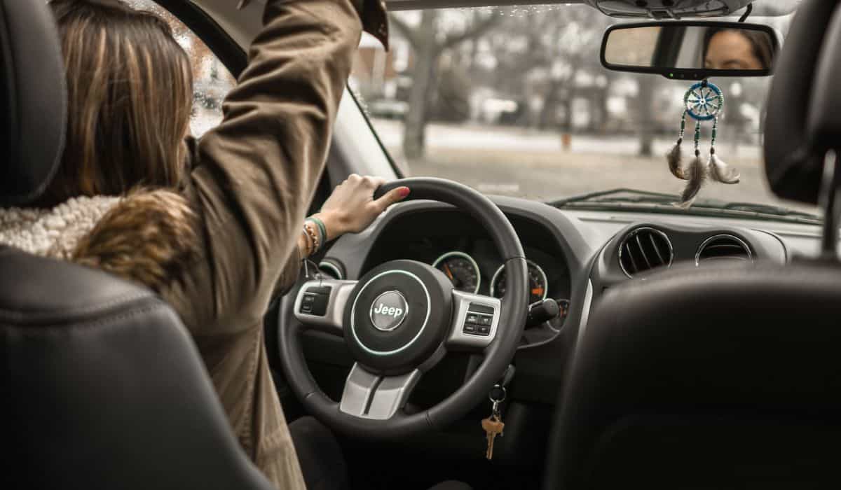 Woman driving a jeep