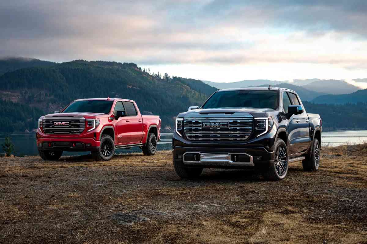 What is the best lift kit for a GMC Sierra? Generic image shows a red and dark blue GMC Sierra