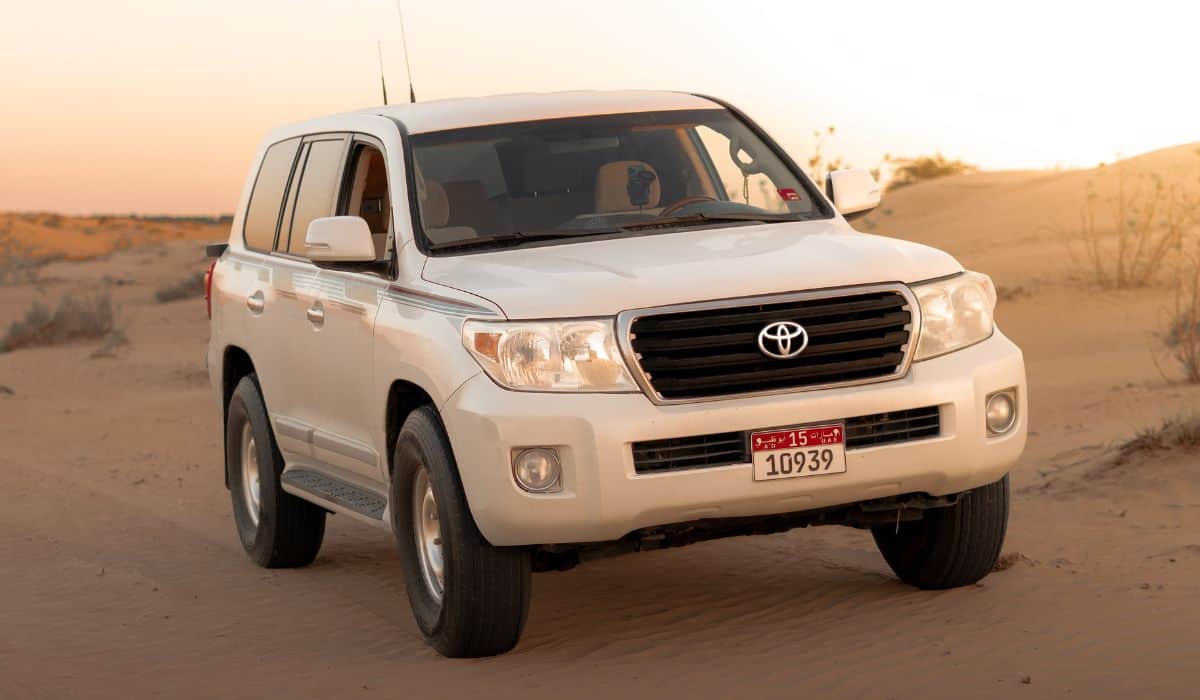 White SUV on Brown Sand