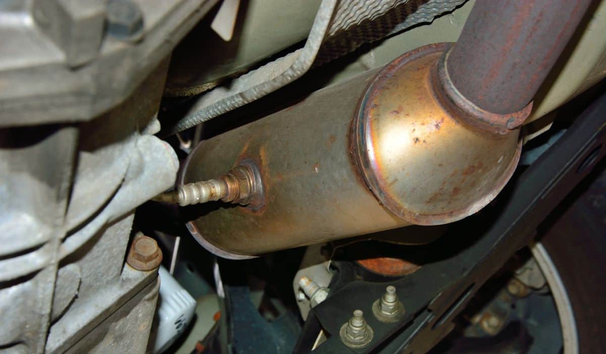 Catalytic Converted with O2 Sensor Under Automobile
