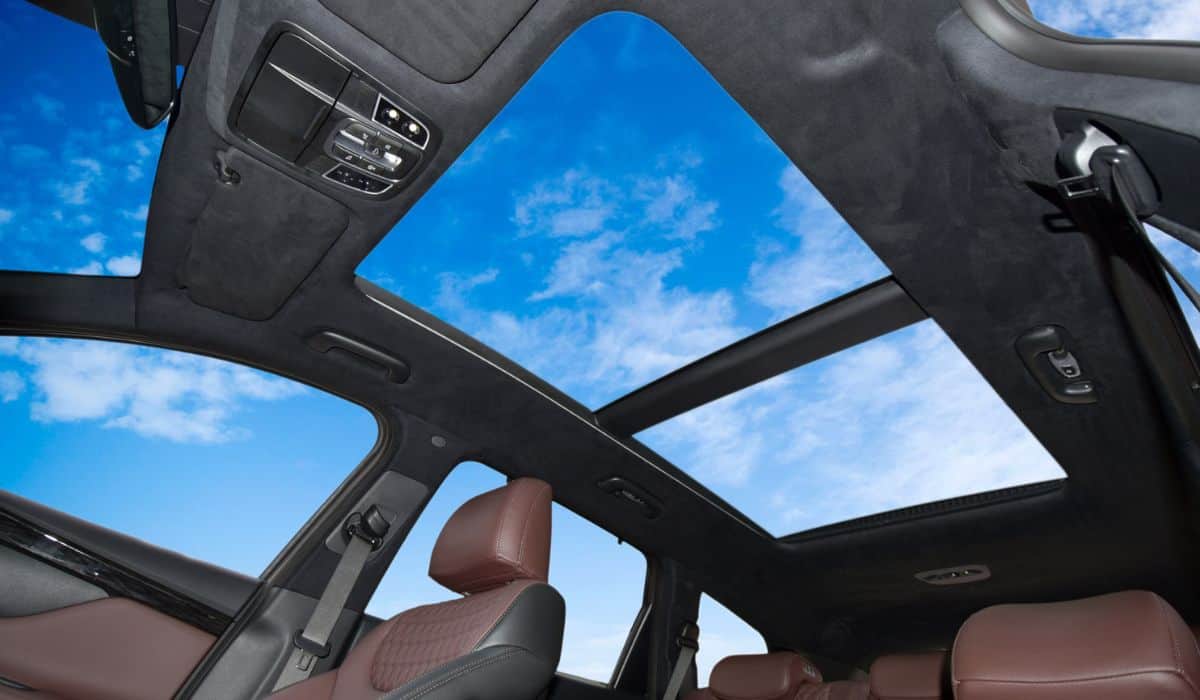 Image for the 10 best used SUV with a panoramic sunroof shows a sunroof against a blue sky
