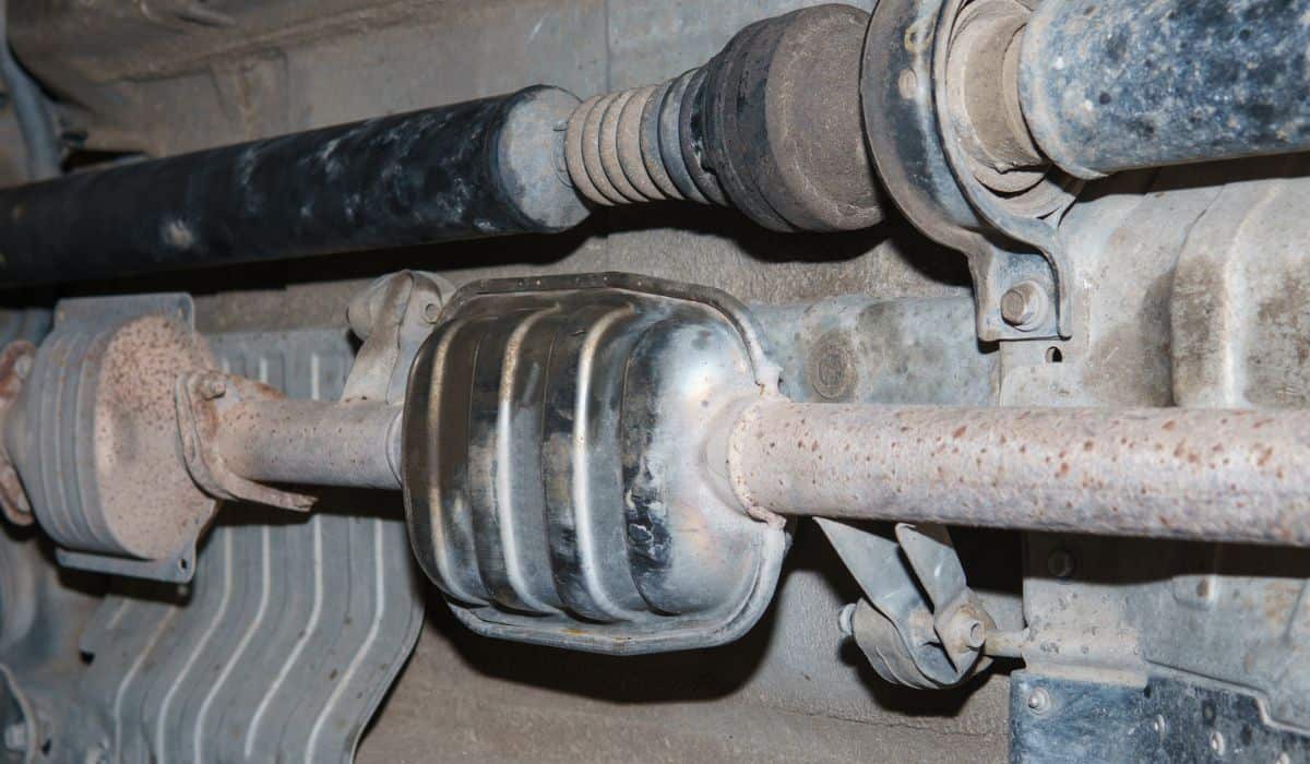 Vehicle underbody exhaust pipe and catalyst