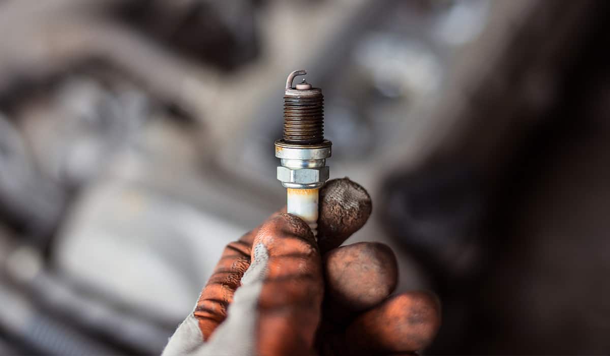 close up to a broken Spark Plug Ford V10 Reliability: Which Models Should You Avoid? 