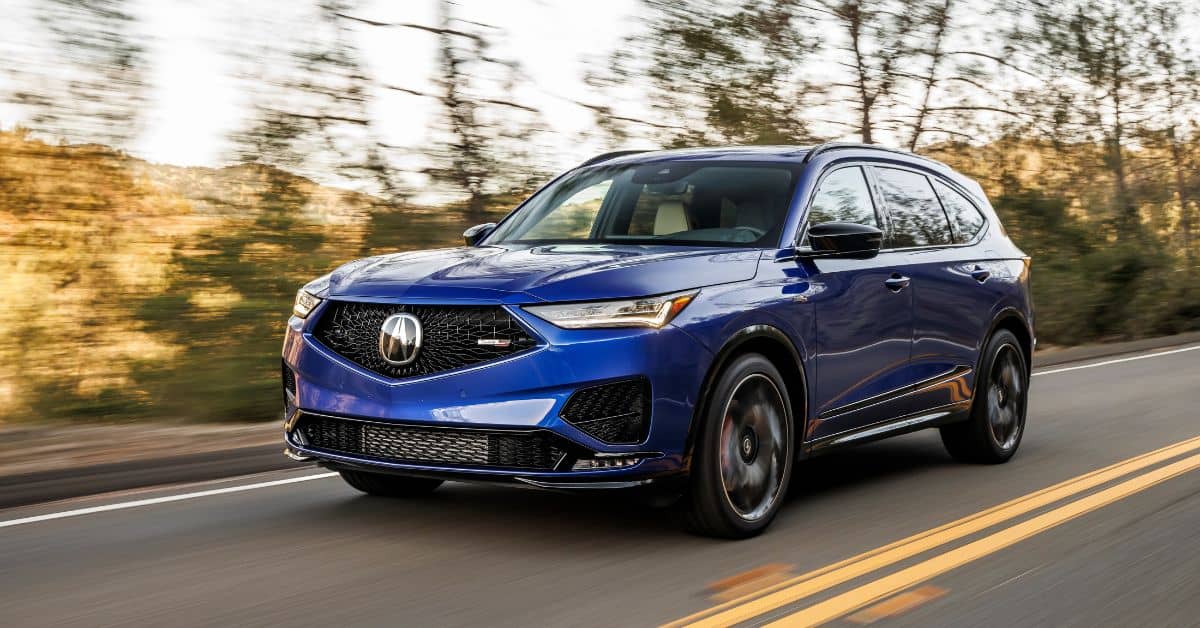 Image for Acura MDX years to avoid: the image shows a metallic blue Acura MDX 