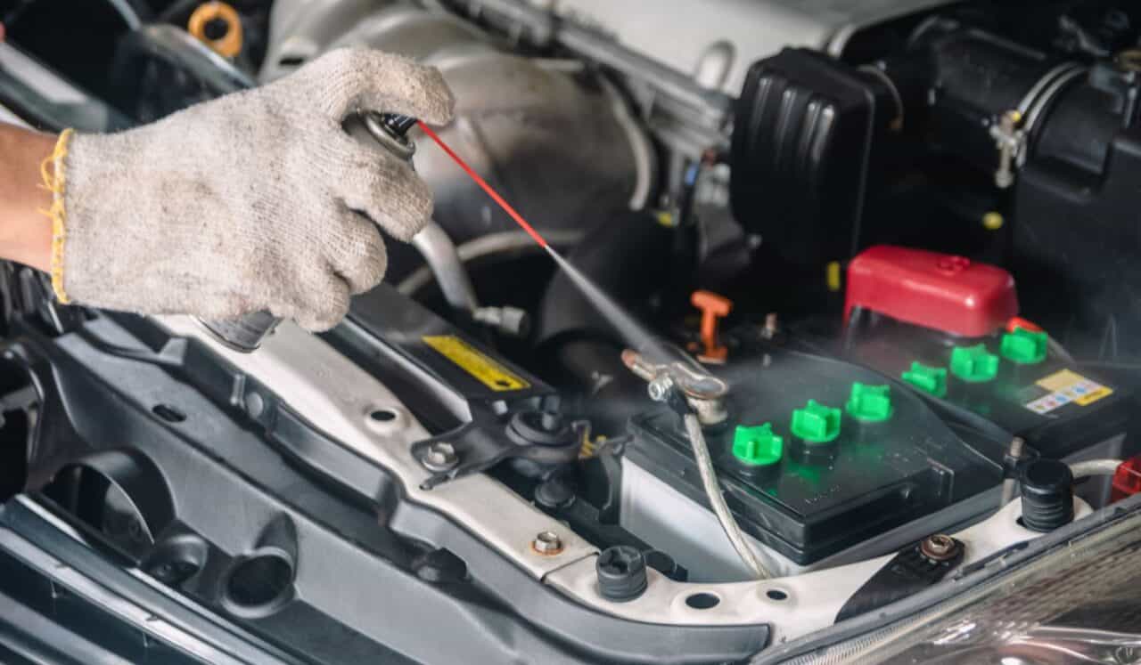 Auto mechanic Repair maintenance and car inspection cleaning battery