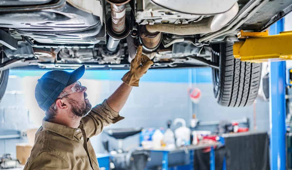 Professional Mechanic Performing Car Undercarriage Inspection What’s the Average Weight of a Catalytic Converter?