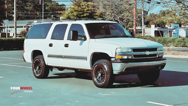 photo of a suburban on all terrrain tires for roadtrips and upgrading