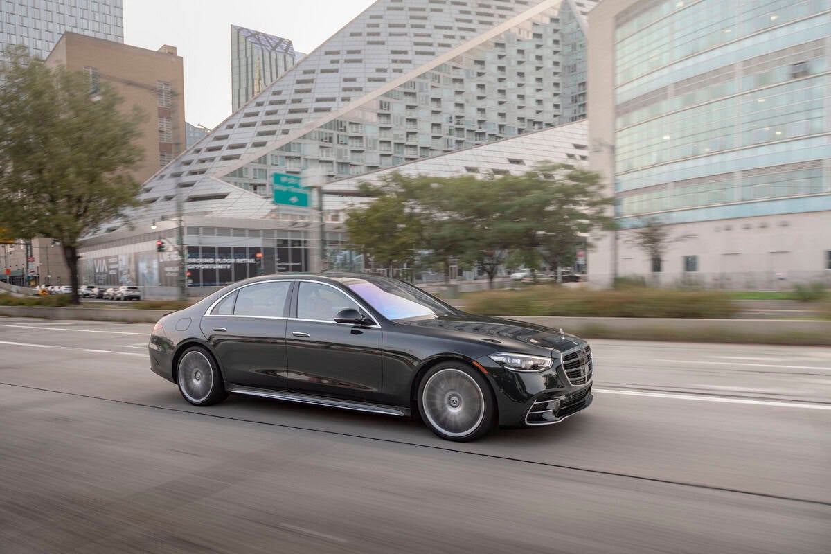 photo of a Mercedes S500 sedan driving down the street