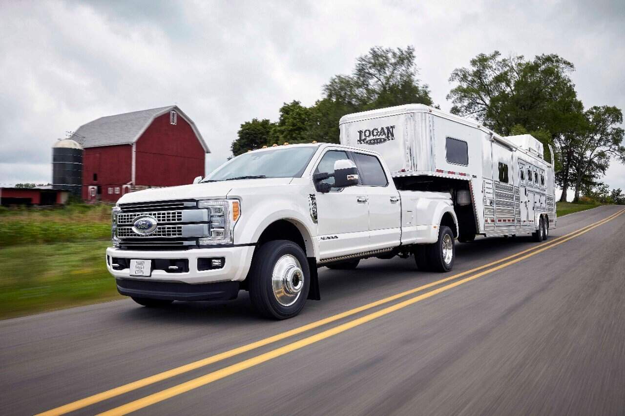 The $10,000 Failure Lurking In Ford Super Duty Diesels 1 photo of a Ford Super Duty truck towing a horse trailer on the street