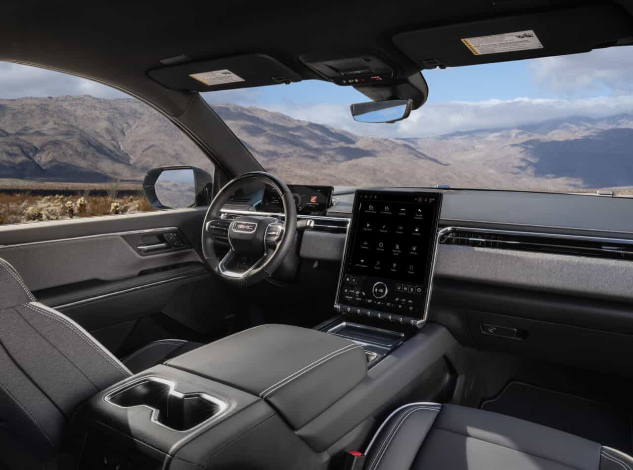 The 2026 Sierra Ev Elevation: Surprisingly Down To Earth 2 Front-facing 3/4 shot of the 2026 GMC Sierra EV Elevation interior.